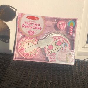 Melissa & Doug Wooden Triple-Layer Party Cake . Ages:3+.